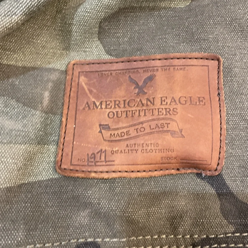 American Eagle Green Black  Camo Canvas Backpack Cinch Up back Multi Pockets